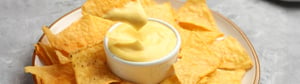 Mixing canola oil in cheese sauce –
Fristam Colloid Mixer.